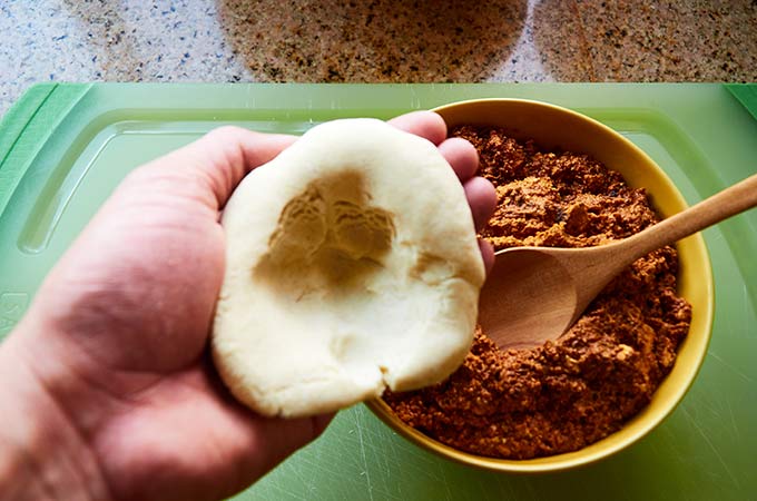 Making an Indentation in the Dough Ball