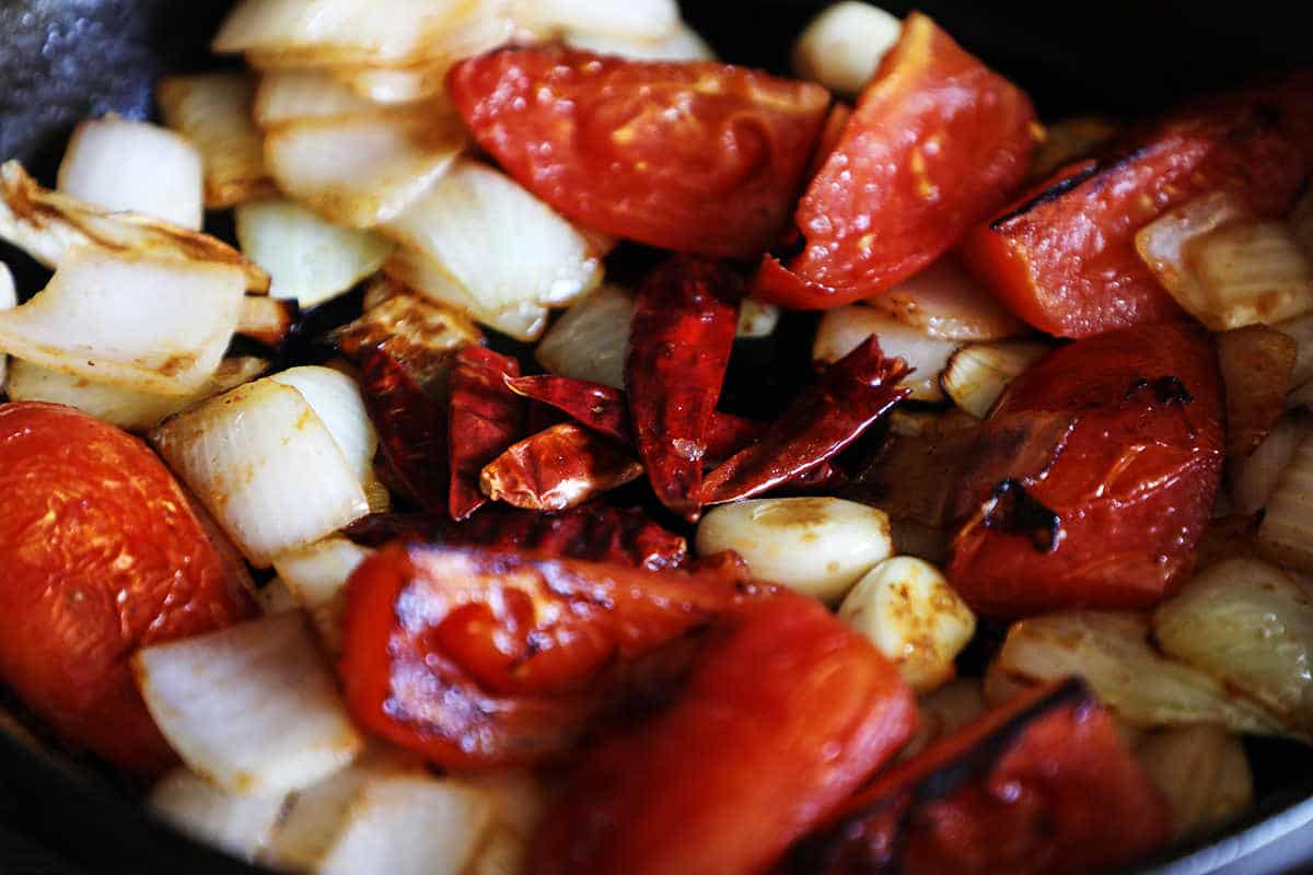 Tomatoes, Onion, and Arbol Chile in Frying Pan