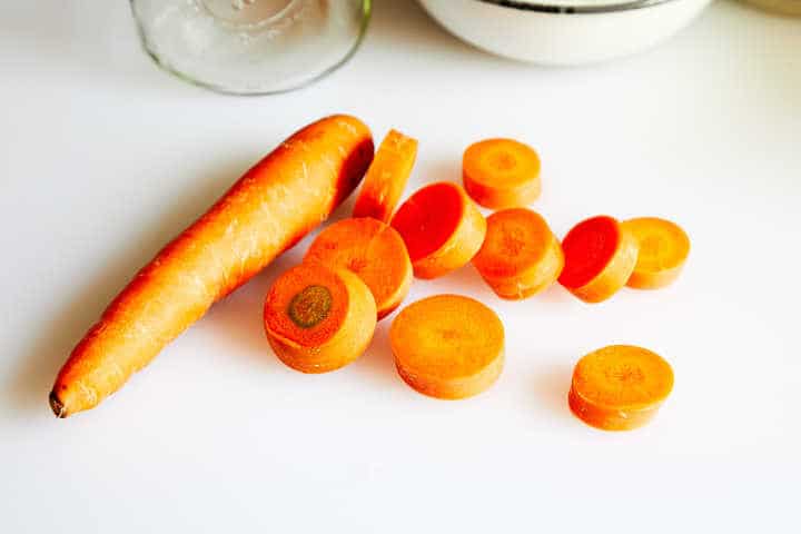 Chopped Carrots on Cutting Board
