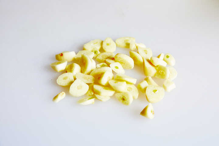 Chopped Garlic on Cutting Board