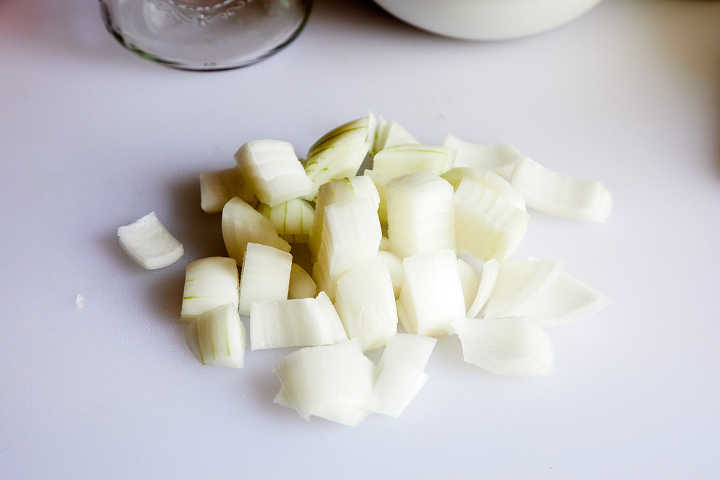 Chopped Onions on Cutting Board