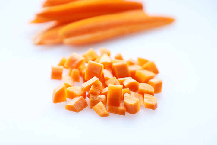 Diced Carrots on Cutting Board