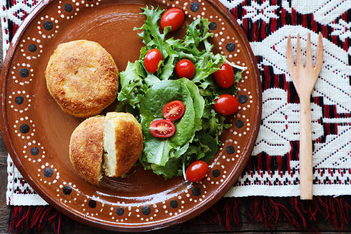 Mashed potato croquettes with green salad.