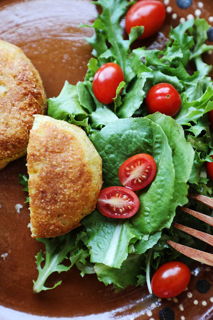 Mexican potato croquettes with a green salad.