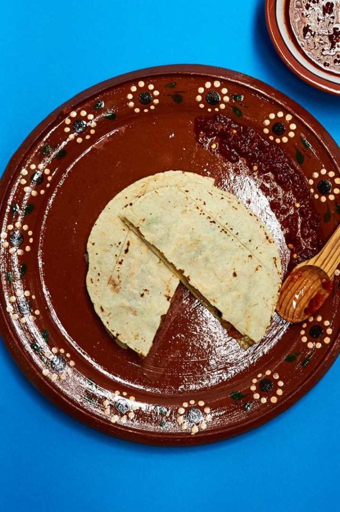 Huitlacoche (corn mushroom) filled quesadilla served with salsa roja.